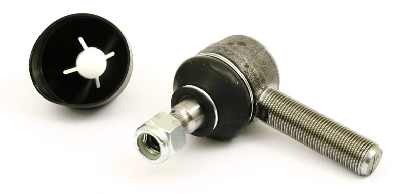A mechanical component with a cylindrical body and detachable cap.
